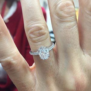 Oval Shaped Diamond Ring on Finger