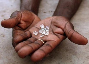 diamond miner holding diamonds
