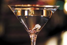 cleaning engagement ring, in martini glass