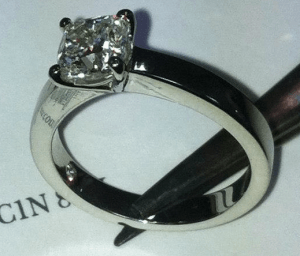 Engagement Ring and Jewellers Forceps