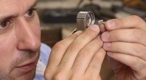Jeweller Quality Control with Diamond Ring